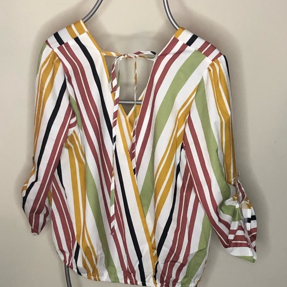 Striped top. 3/4 button sleeves. Tie back. V-neck front and back. Elastic bottom - Picture 3 of 4